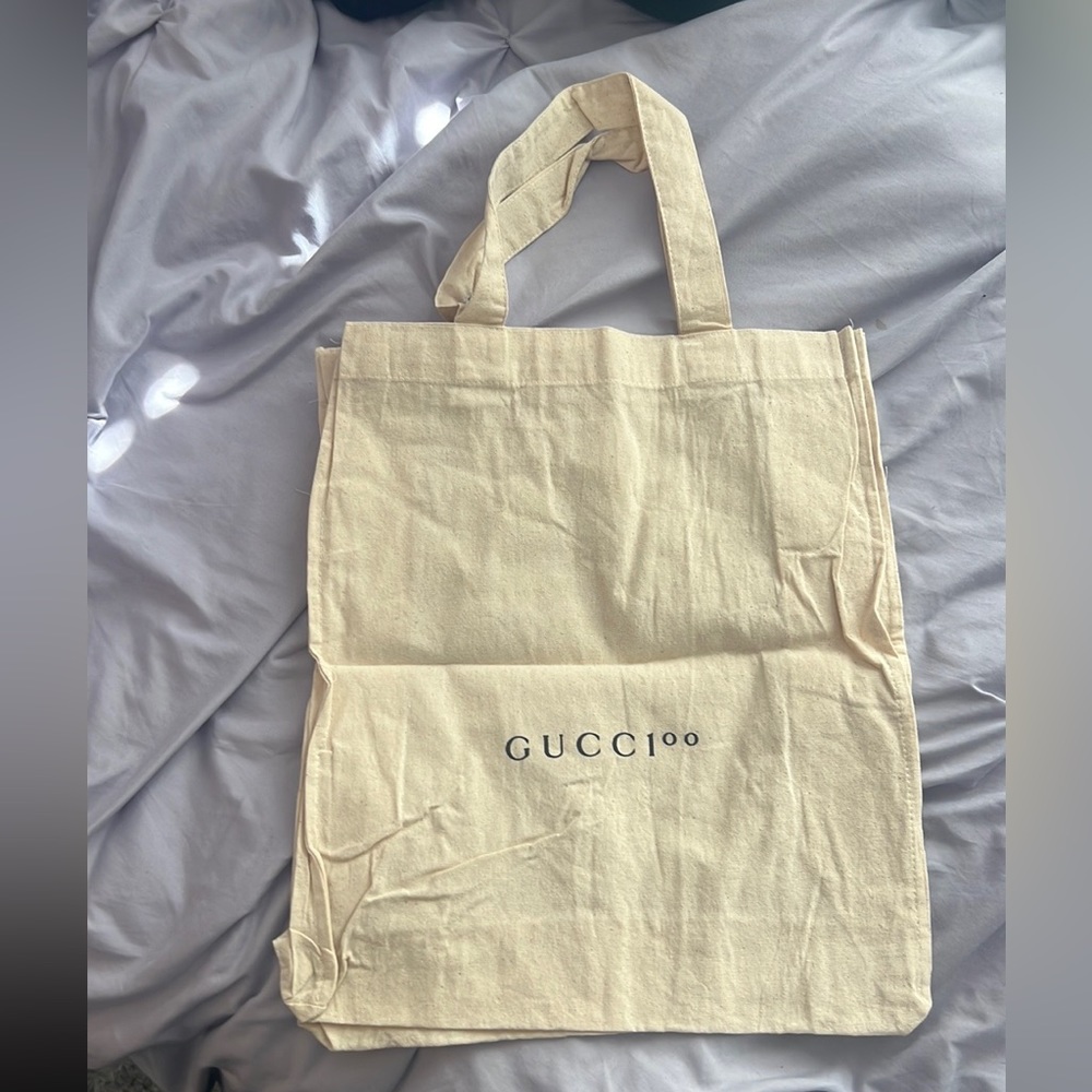 authentic gucci hand bag/dust bag